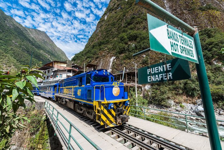 aguas calientes, peru july 17: perurail train between aguas ca